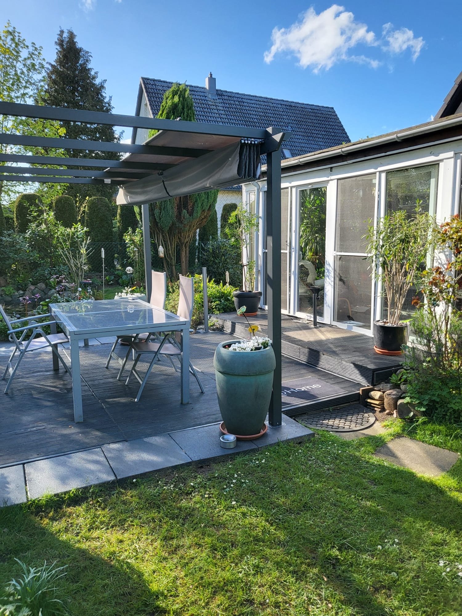 Terrasse mit Wintergarten